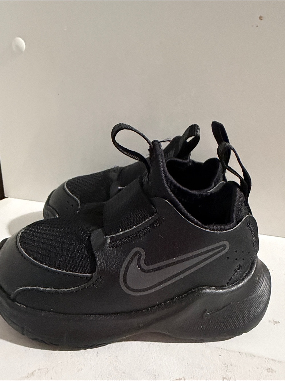 Nike Kids Black Slip-On Athletic Sneakers with Reflective Swoosh